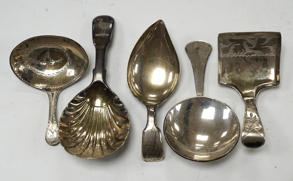 Five assorted silver caddy spoons, including shovel bowl by Cocks & Bettridge, Birmingham, 1810, 61mm, leaf bowl by William Pugh, Birmingham, 1814, Eley & Fearn, London, 1804, bright cut engraved bowl, George Baskerville
